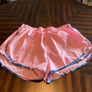 Pink Nike athletic shorts